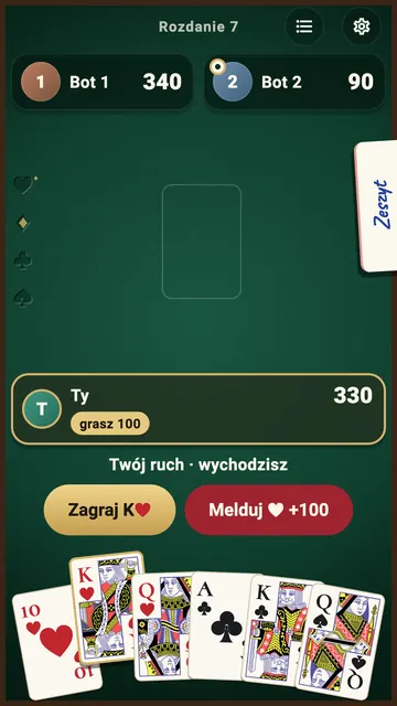 Gra na telefonie: twoje wyjście i przyciski „Zagraj K♥” oraz „Melduj ♥ +100”.